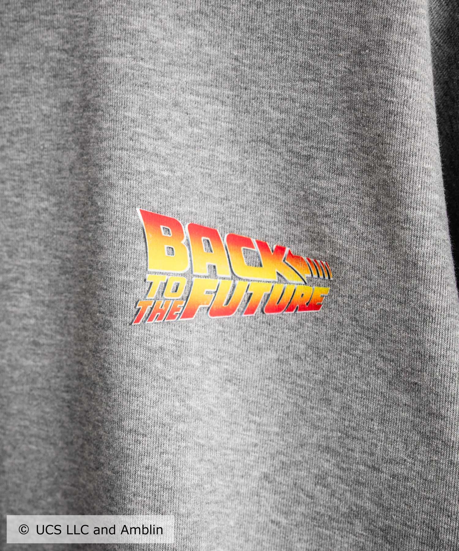 Universal City Studios LLC 別注コラボ オーバーサイズヴィンテージライクグラフィックプリント裏起毛スウェットトレーナー 15115