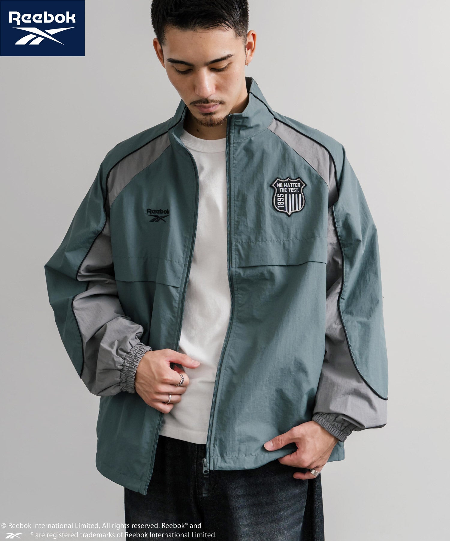 Reebok リーボック オーバーサイズエンブレム刺繍ナイロンジャケット