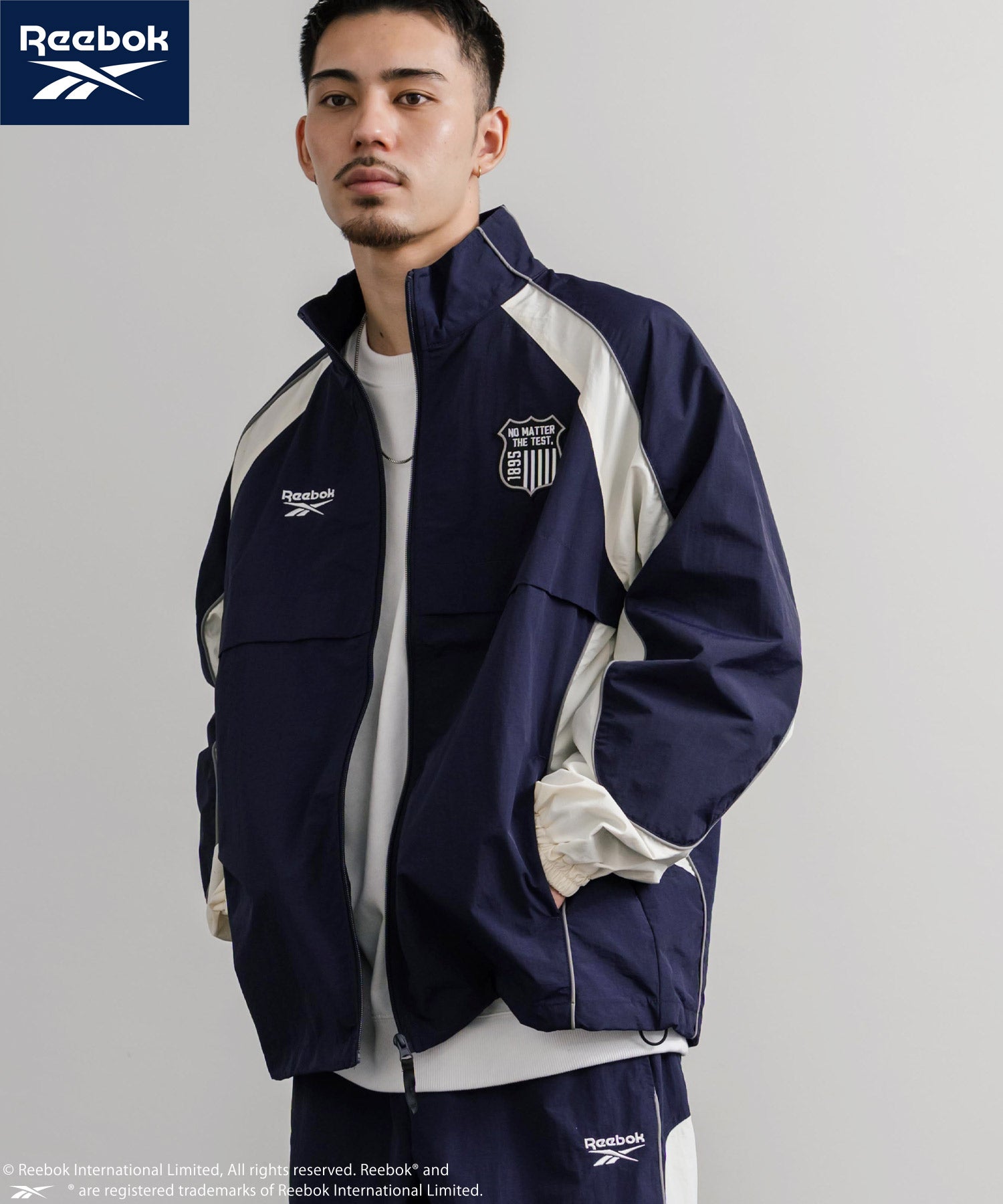 Rokkan ナイロンジャケット ネイビー Reebok リーボック オーバーサイズエンブレム刺繍ナイロンジャケット