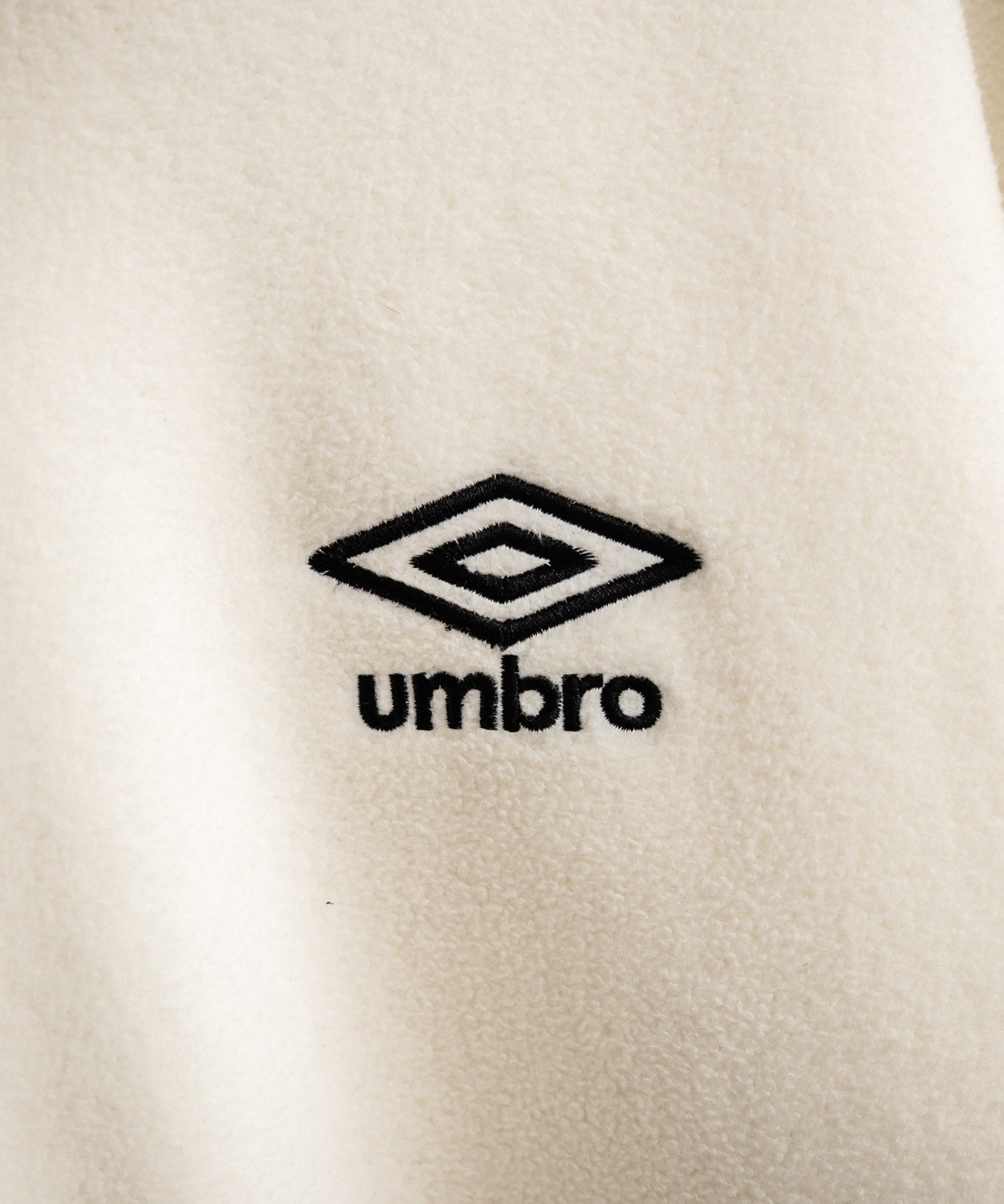 UMBRO 別注コラボオーバーサイズワンポイントロゴ刺繍サイドラインハーフジップフリース 14946