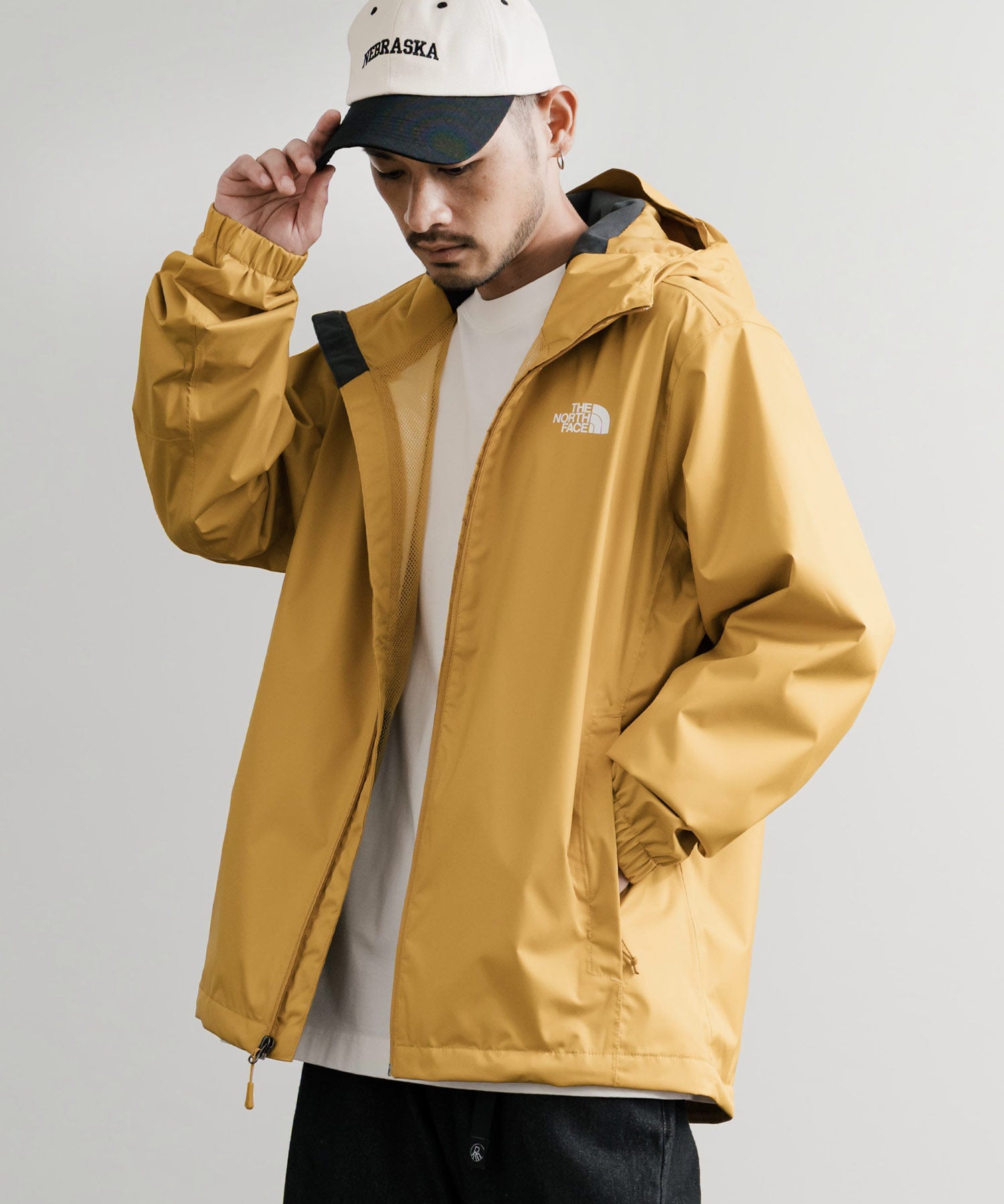 ノースフェイス　マウンテンパーカー　ブラウン×イエロー　メンズXS レディースＭ THE NORTH FACE (ザ ノースフェイス) 切り替え ロゴプリント