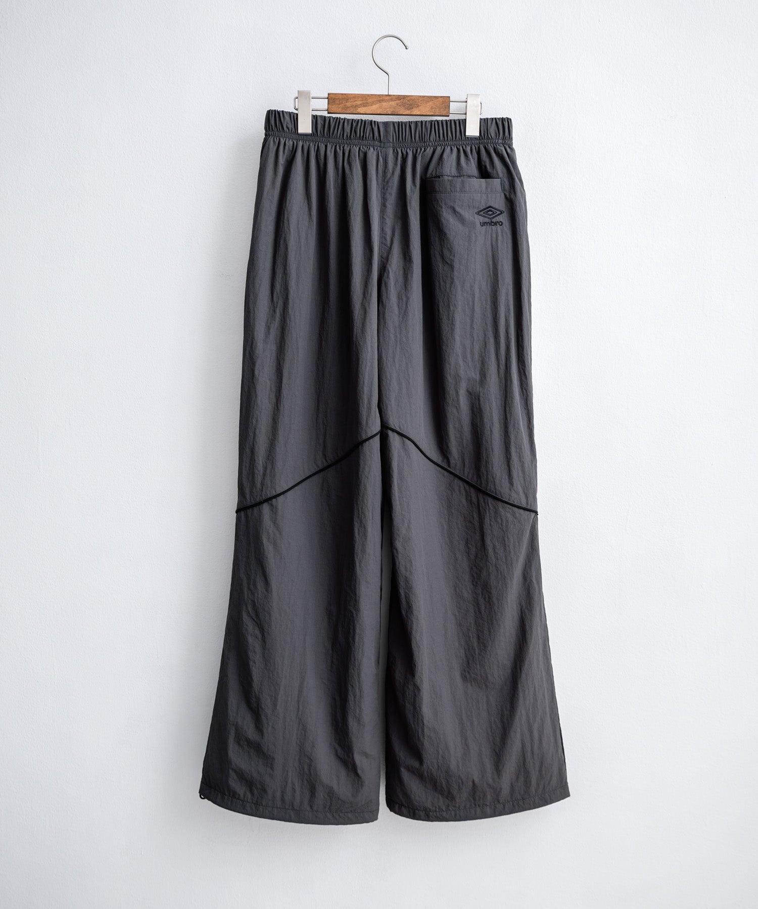 UMBRO アンブロ 裾スピンドルパイピングナイロンイージーパンツ/ワイドトラックパンツ 16394【セットアップ可能】