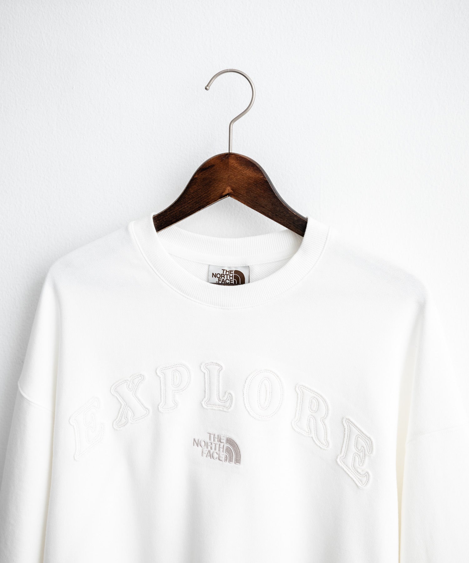 日本未展開モデル THE NORTH FACE ザ・ノースフェイス WHITE LABEL ホワイトレーベル EXPLORE SWEATSHIRTS アップリケ刺繍裏毛長袖スウェット/アーチロゴトレーナー 16595