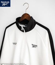Reebok リーボック オーバーサイズ袖ラインワンポイントロゴ刺繍ポンチトラックジャケット 14837