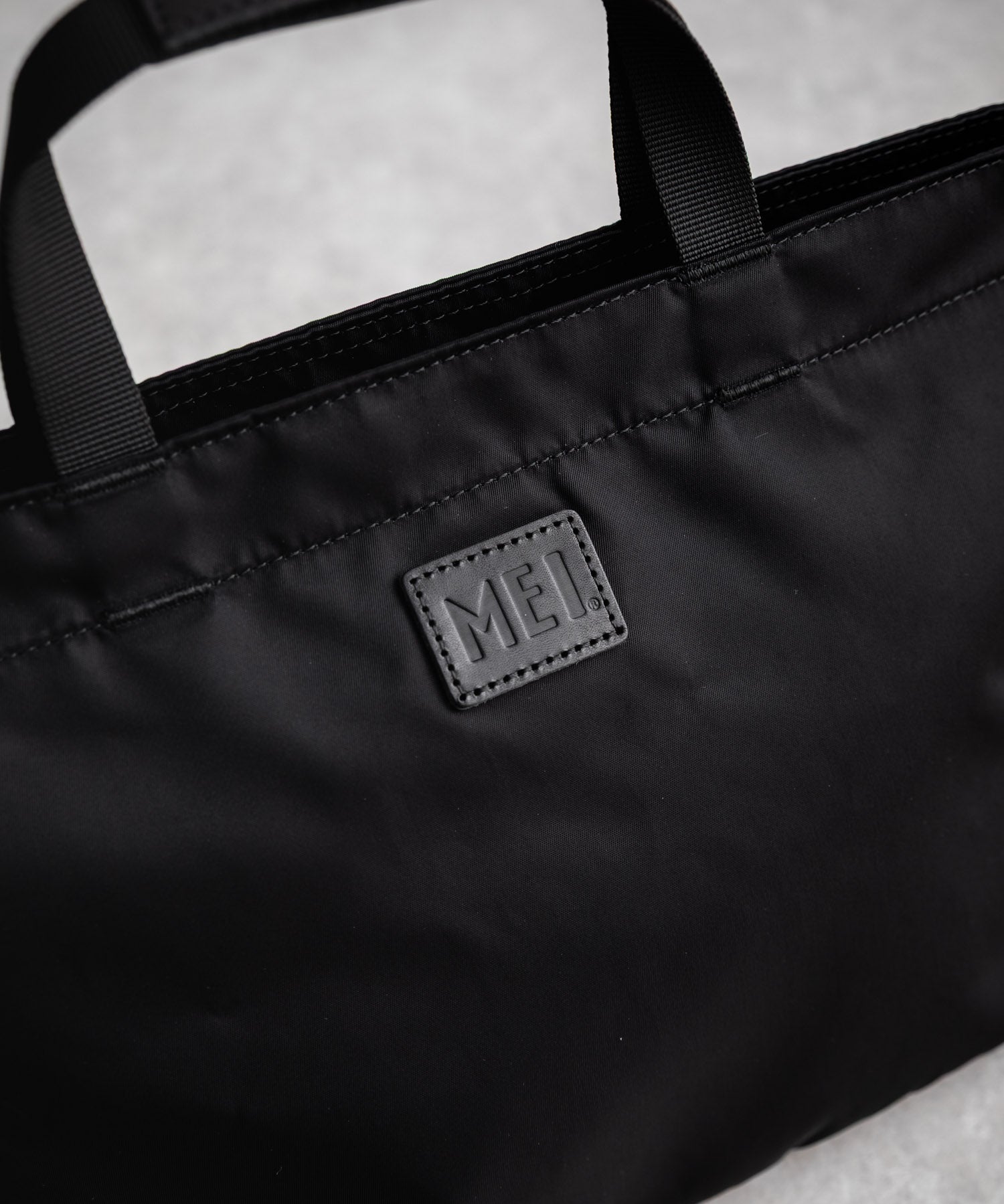 MEI TOTEBAG M ロゴプレート2WAYトートショルダーバッグ 16197