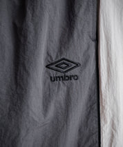 UMBRO アンブロ 裾スピンドルパイピングナイロンイージーパンツ/ワイドトラックパンツ 16394【セットアップ可能】
