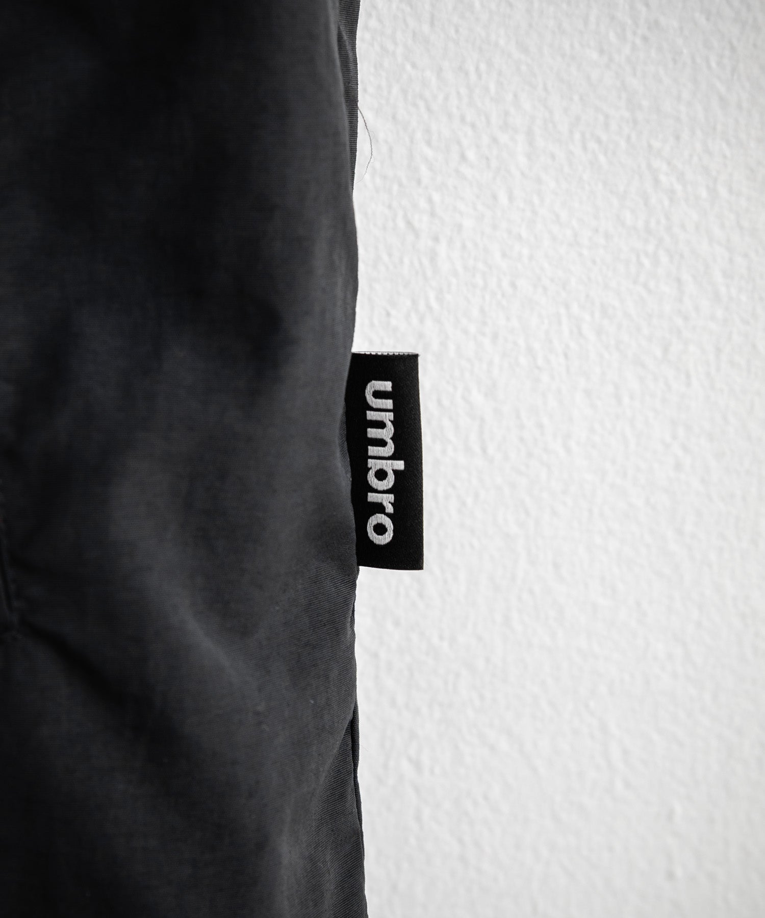 UMBRO アンブロ 別注コラボ ルーズシルエット裏メッシュスタンドネックワンポイントロゴ刺繍ナイロンベスト セットアップ可能