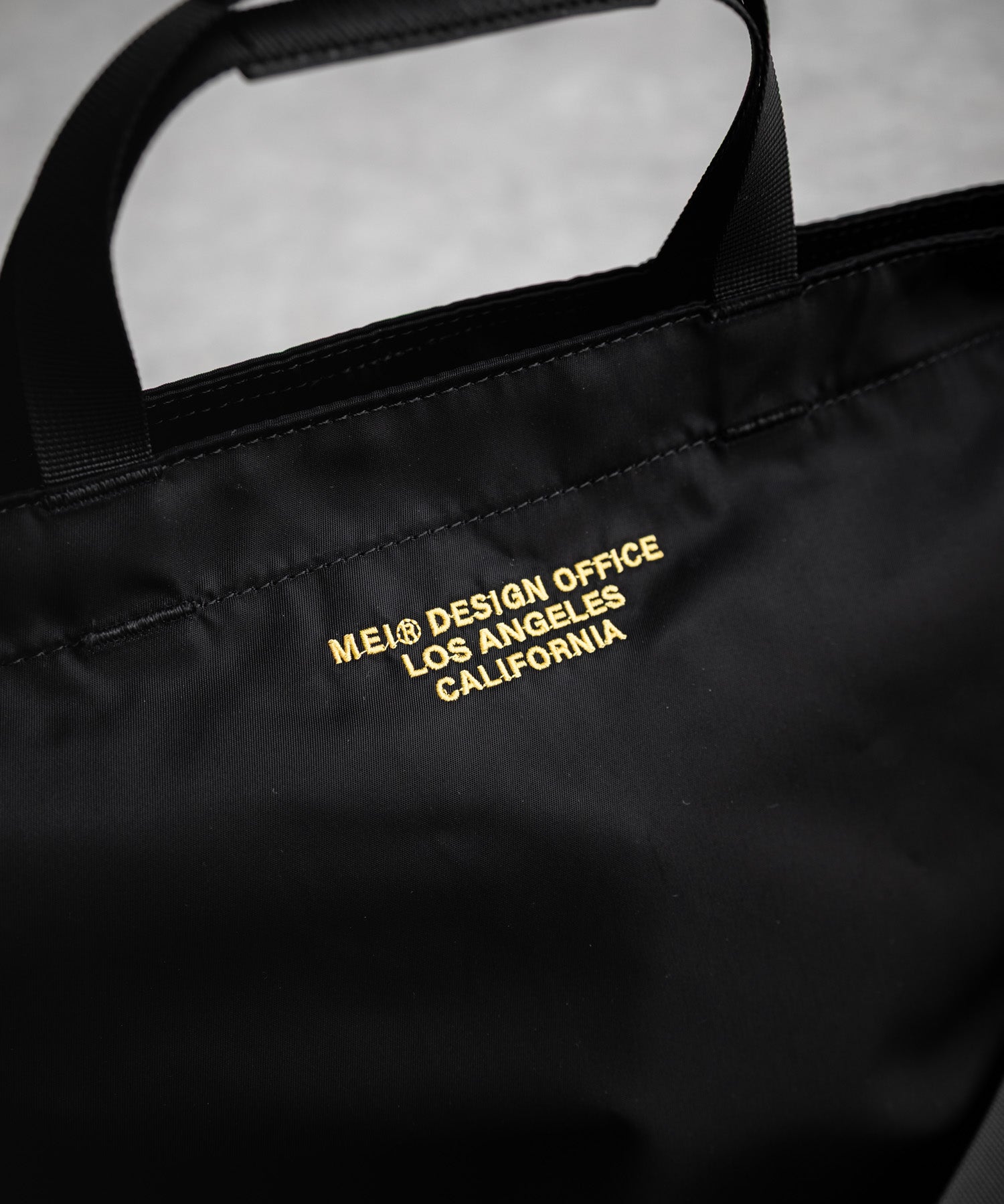 MEI TOTEBAG M ロゴプレート2WAYトートショルダーバッグ 16197